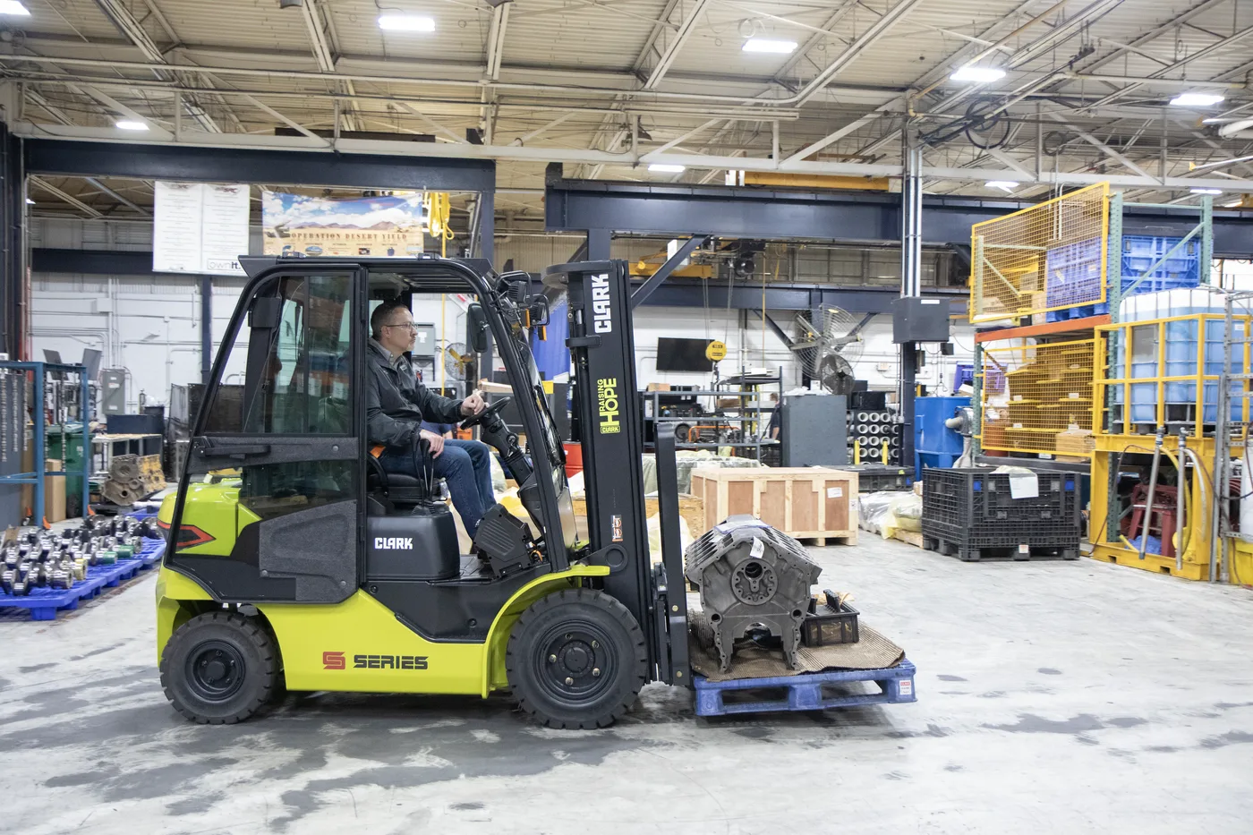 Clark S-Series forklift moving a machined casting in a Central PA manufacturing plant